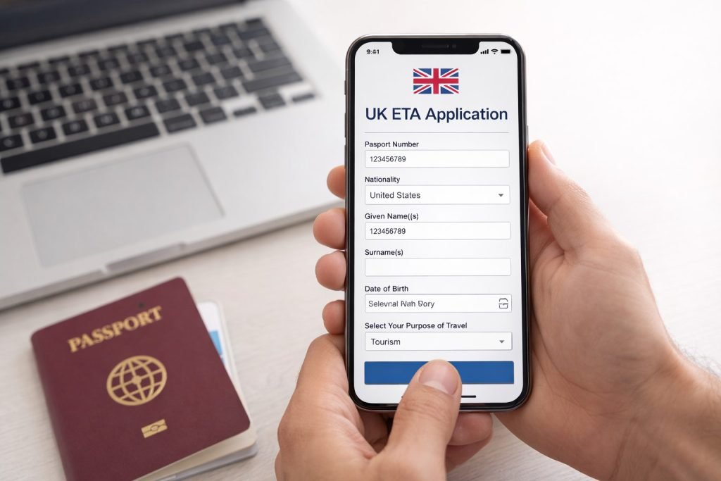 Apply for UK ETA Online Without Mistakes: Step-by-Step Approval Guide 1 Person completing UK ETA online application form on smartphone with biometric passport beside laptop
